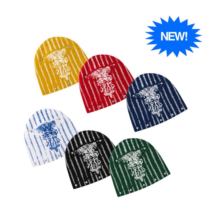 Six knit beanie hats in different colors, each with vertical stripes and a central graphic, arranged on a white background with a blue starburst that says NEW! The hats are yellow, red, navy, white, black, and green.

#products1